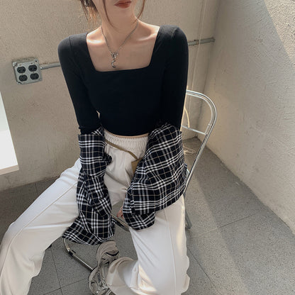 Woman wearing Slim Fit Long Sleeve Square Neck Top in a stylish setting