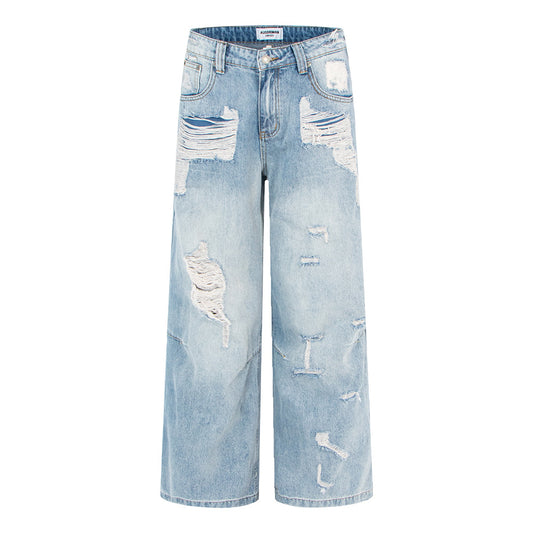Woman wearing Vintage Distressed Wide Leg Jeans in an urban setting