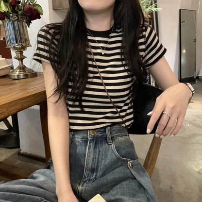 Woman wearing Striped Slim Fit T-Shirt in a casual setting