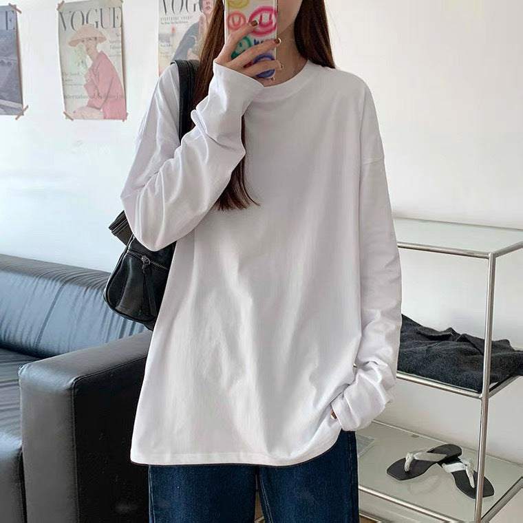 Woman wearing Women's Long Sleeve Loose Fit Basic Tee Top in a casual setting