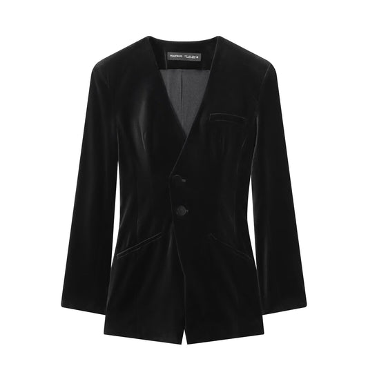 Woman wearing Flat Velvet V-Neck Jumpsuit in a stylish setting