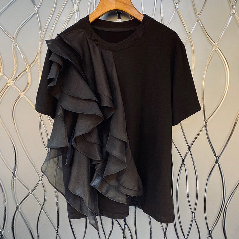 Woman wearing Patchwork Ruffle T-Shirt in a casual summer setting