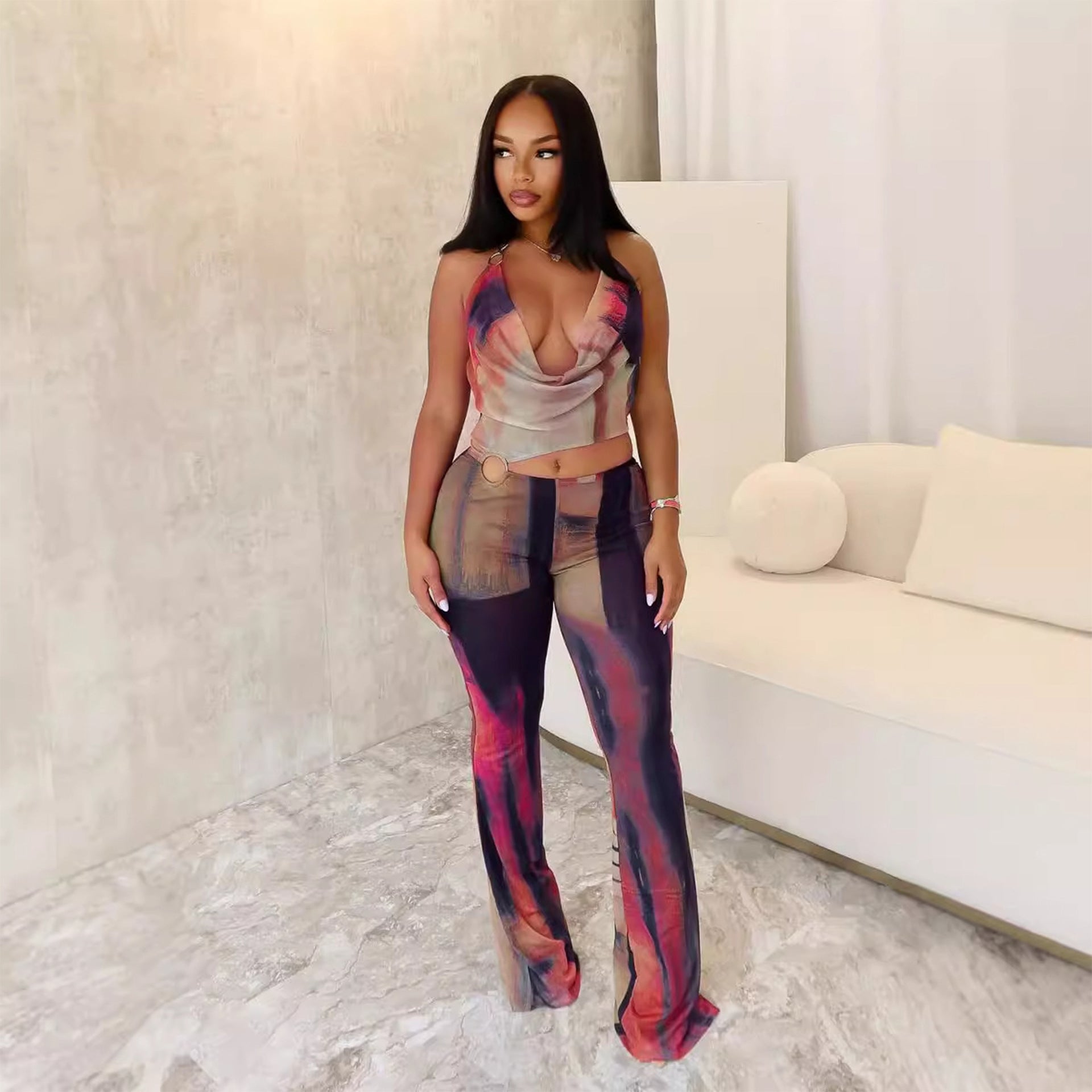Woman wearing Flattering Mesh Printed Jumpsuit in an urban setting