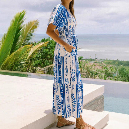 Woman wearing One-Shoulder Puff Sleeve Flared Maxi Dress in a garden setting