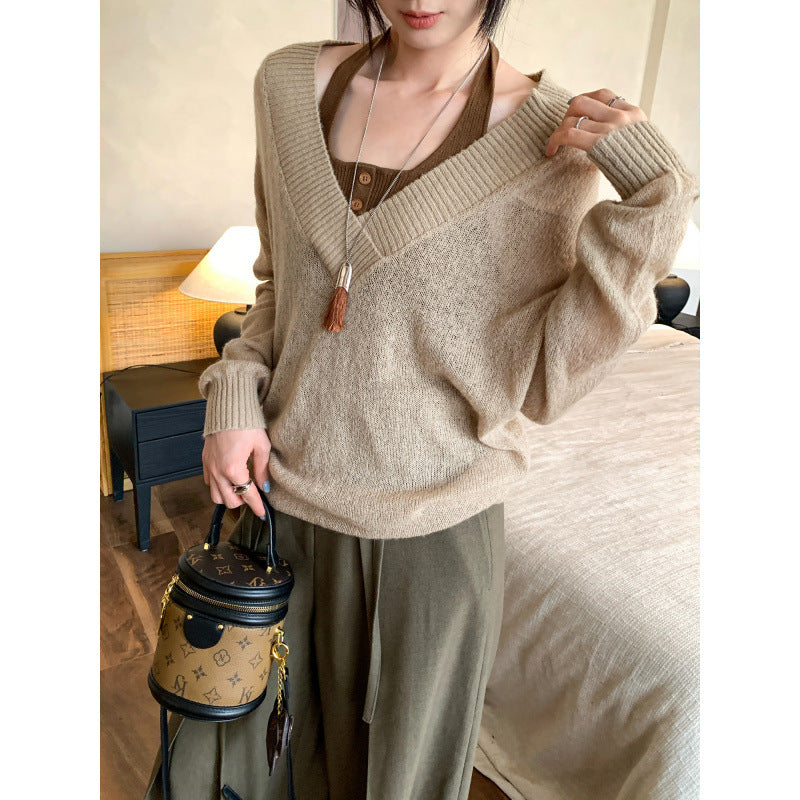 Woman wearing Faux Two-Piece Wool V-Neck Knit Sweater in a casual setting