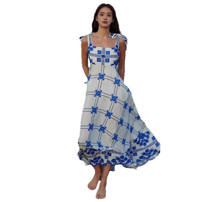 Woman wearing Lace Splice Strap Midi Dress in a sunny outdoor setting