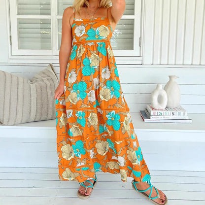 Woman wearing One-Shoulder Leaf Print Boho Maxi Dress in a sunny outdoor setting