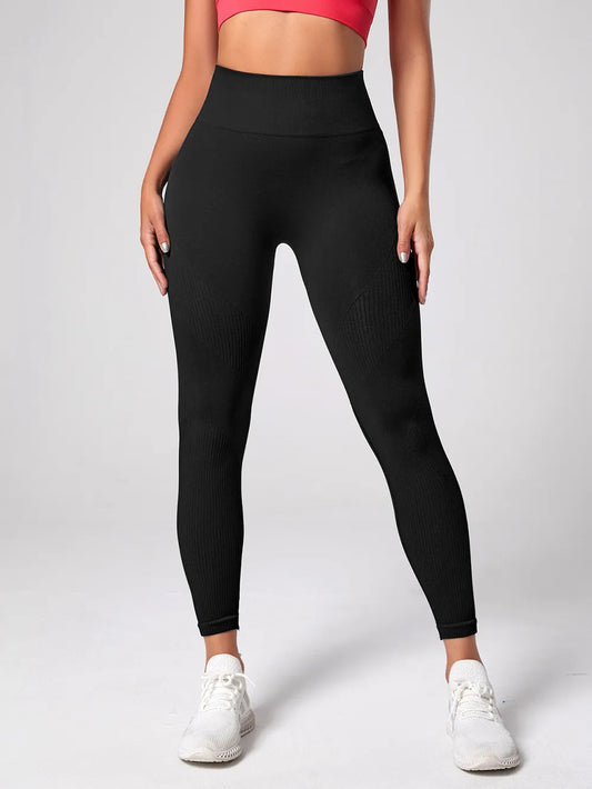 Woman wearing High Waist Active Leggings in a workout setting