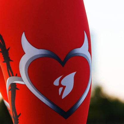 Woman wearing Heart Print Leggings in a casual setting