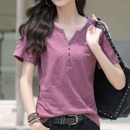Woman wearing Loose Plus Size V-Neck Short Sleeve Casual T-Shirt in a casual setting