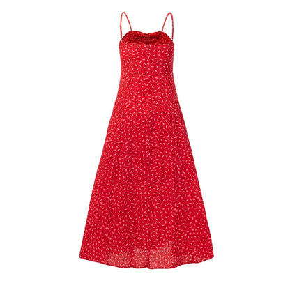 Woman wearing Elegant Classic Print Sleeveless Maxi Dress in a summer garden