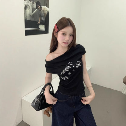 Woman wearing One Shoulder Fitted Crop Top in a casual setting