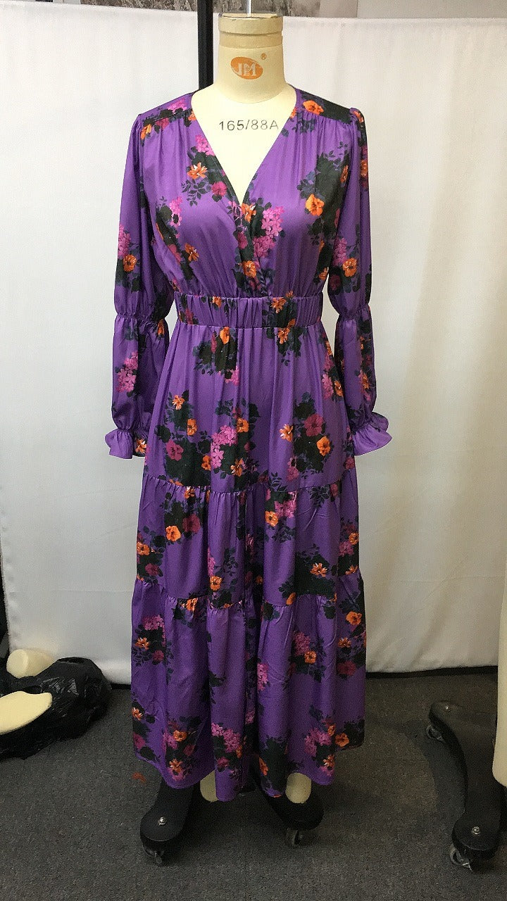 Woman wearing Bohemian Floral Print Long Sleeve Dress in a garden setting