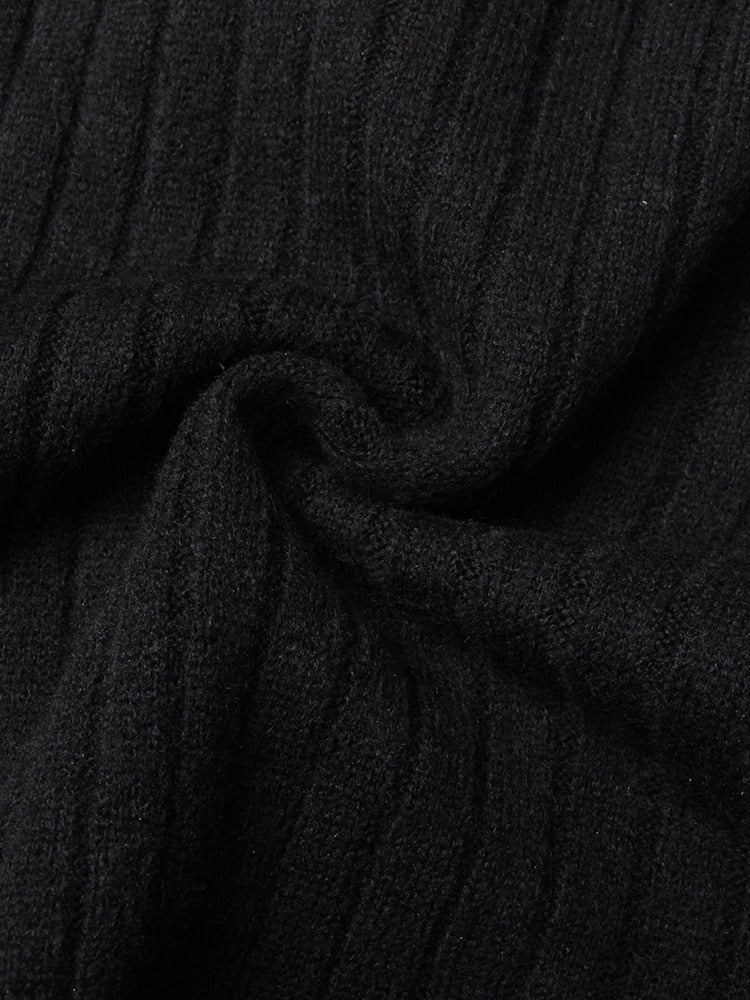 Woman wearing Hollow Out Knit T-Shirt in a casual setting