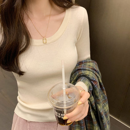 Woman wearing U Neck Long Sleeve Pullover Top in a casual setting