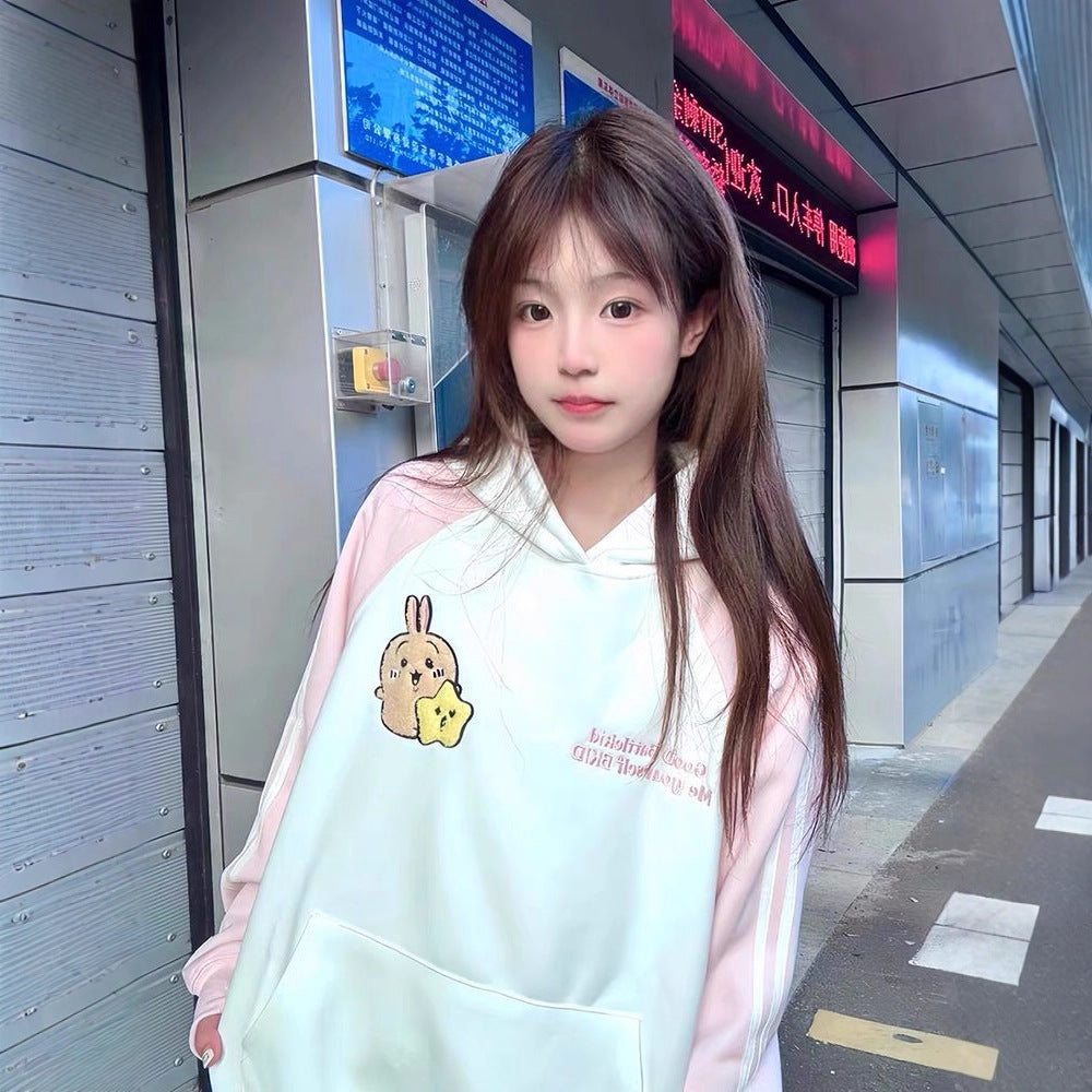 Woman wearing Street Style Embroidered Hoodie in a casual outdoor setting