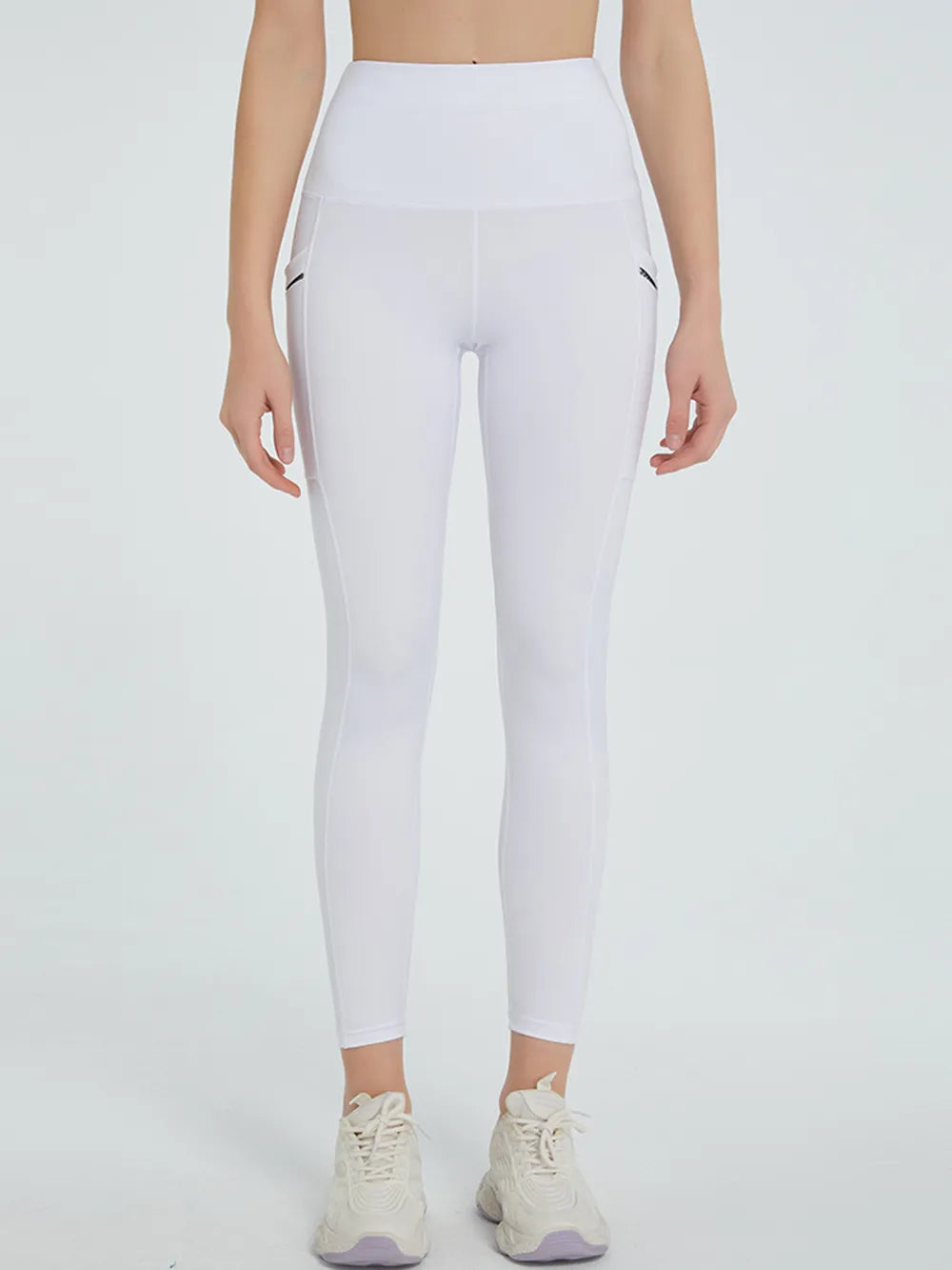 Woman wearing High Waist Active Leggings in a fitness setting