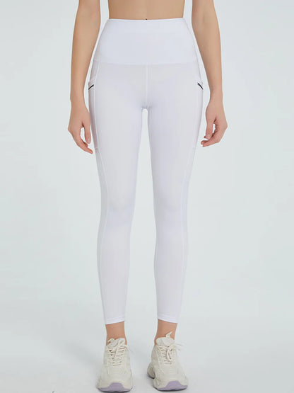 Woman wearing High Waist Active Leggings in a fitness setting