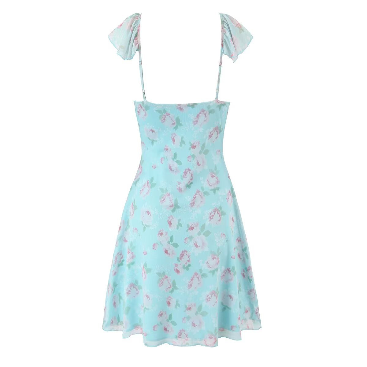 Woman wearing Halter Neck Lace Tie Back Printed Dress in a summer setting