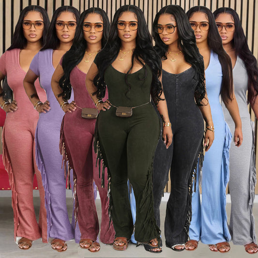 Woman wearing Fringe Detail Slim Fitting Jumpsuit in a city setting