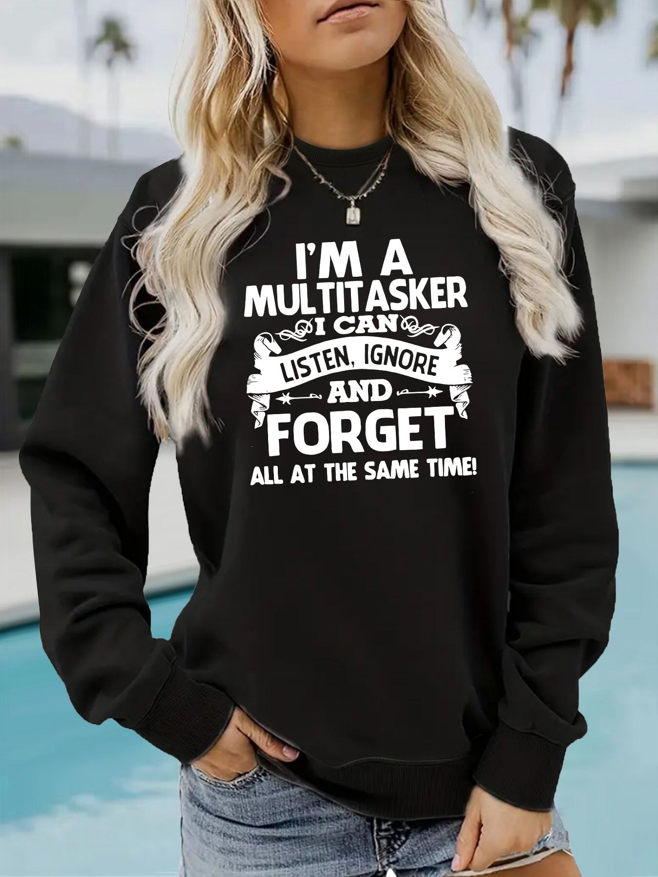 Woman wearing I'm A Multitasker Hoodie in a casual setting