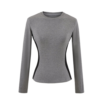Woman wearing Round Neck Color Block Long Sleeve Top in a casual setting