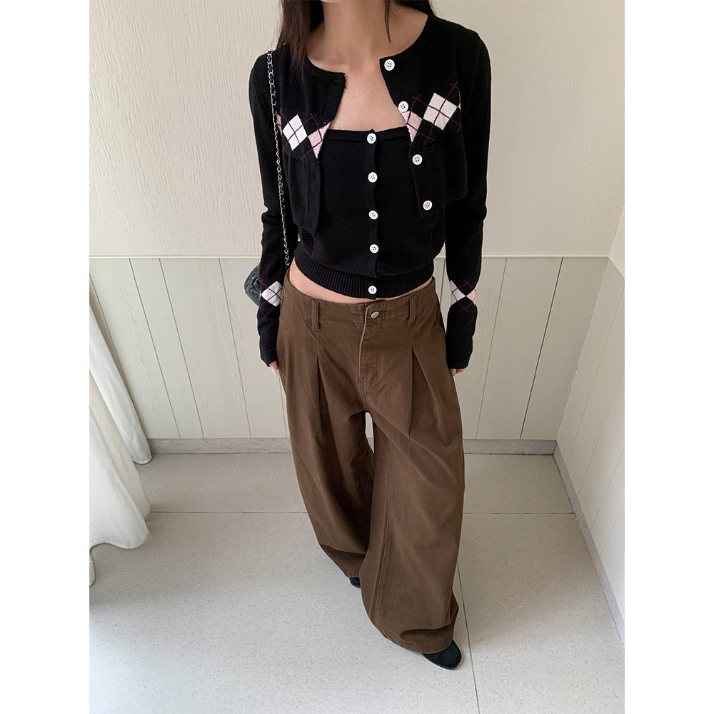 Woman wearing Pleated Wide Leg Jeans in a stylish urban setting