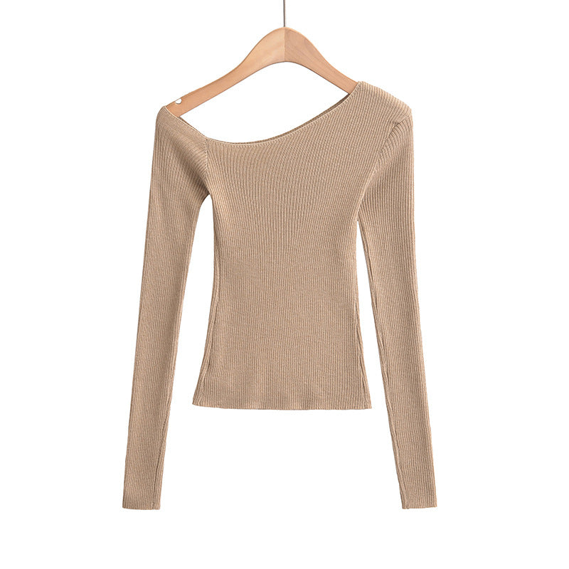 Woman wearing Slanted Shoulder Off Shoulder Slim Fit Top in a casual setting