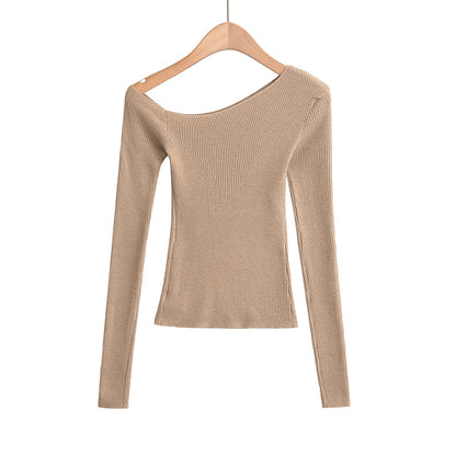 Woman wearing Slanted Shoulder Off Shoulder Slim Fit Top in a casual setting