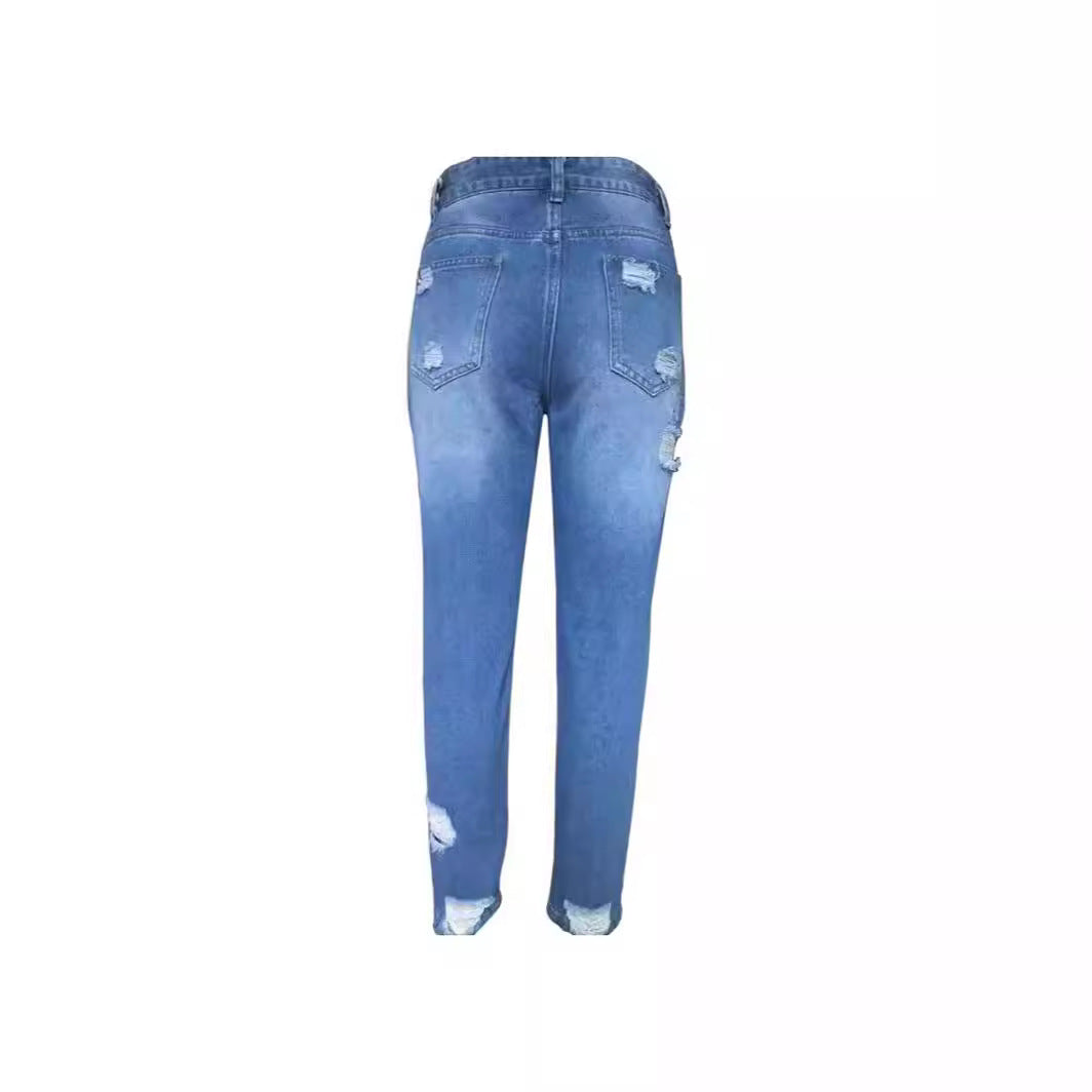 Woman wearing Ripped Mid Waist Jeans in a casual outdoor setting