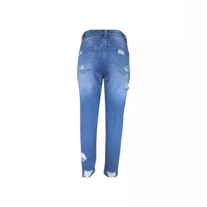 Woman wearing Ripped Mid Waist Jeans in a casual outdoor setting