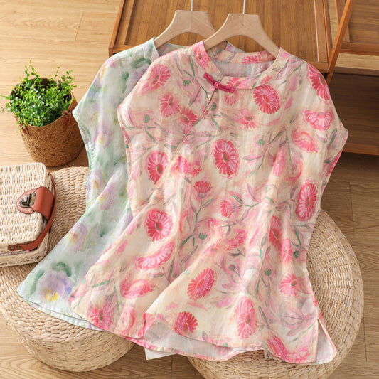 Woman wearing Short Sleeve Floral Blouse in a sunny outdoor setting