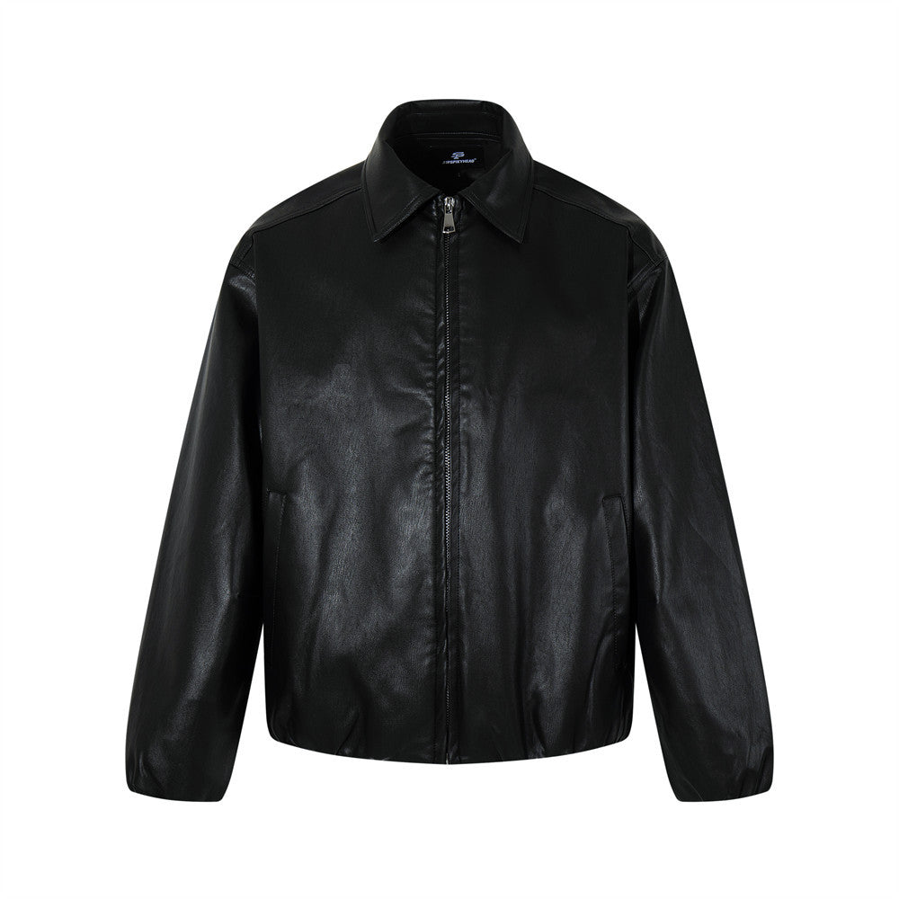 Woman wearing sleek PU leather zip-up jacket in an urban setting