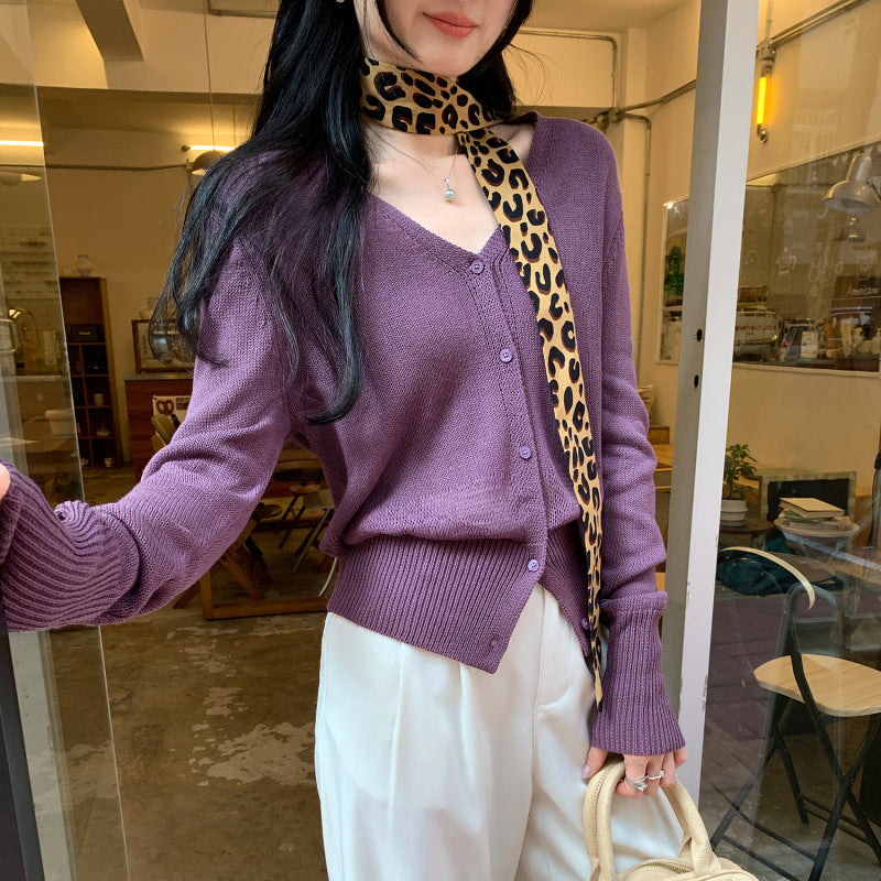 Woman wearing V-Neck Batwing Sleeve Knit Cardigan Coat in a stylish outdoor setting
