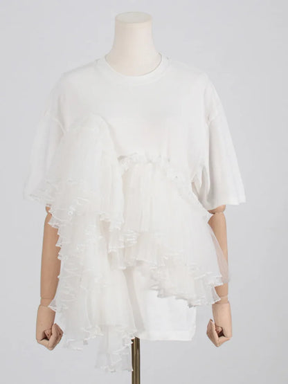 Woman wearing Cotton Mesh Patchwork Loose O Neck Short Sleeve T Shirt in a casual setting
