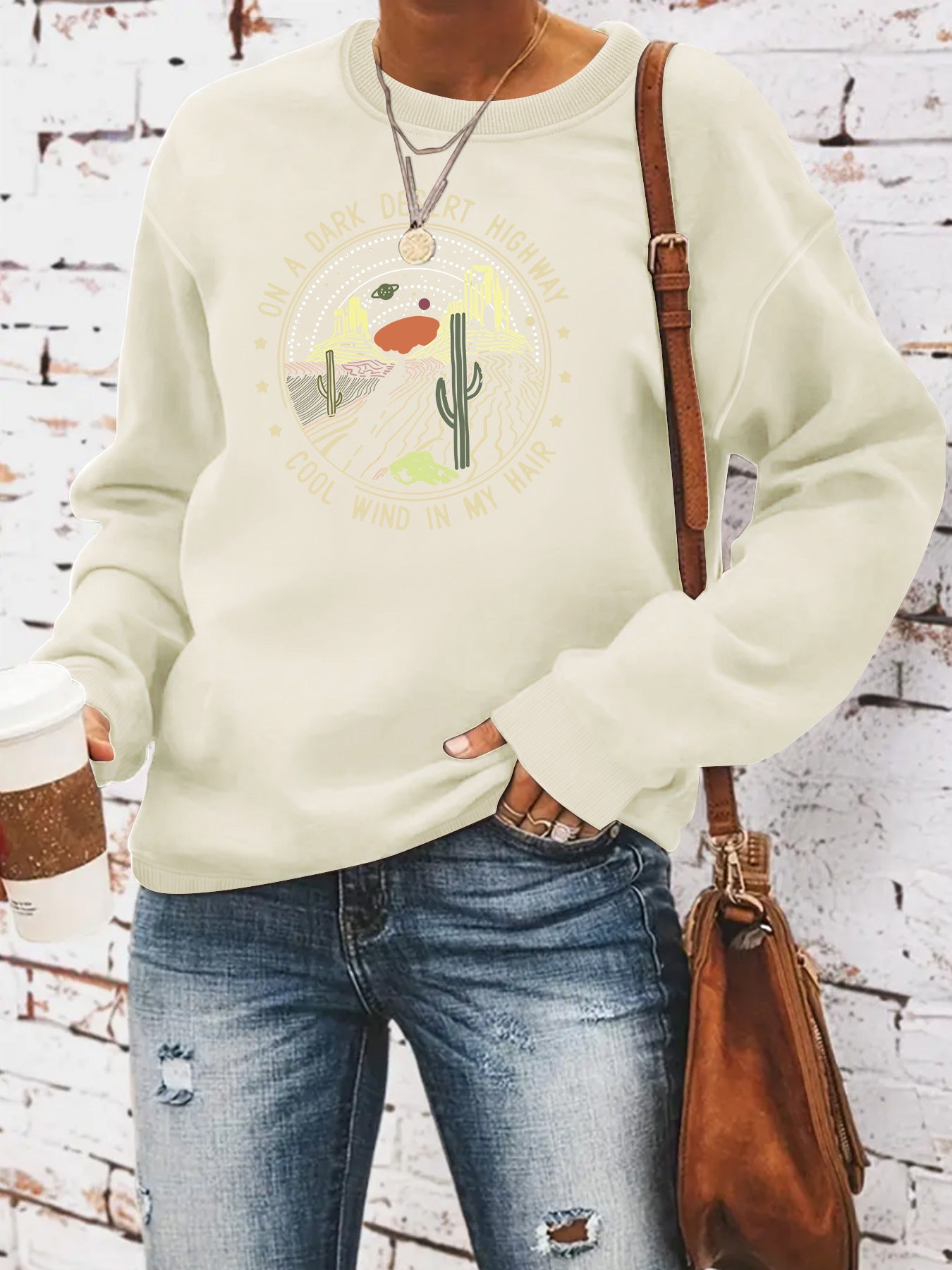 Woman wearing Printed Loose Hoodie in a casual setting