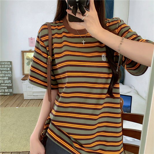 Woman wearing Casual Vintage Color Block Stripe T-Shirt in a casual setting