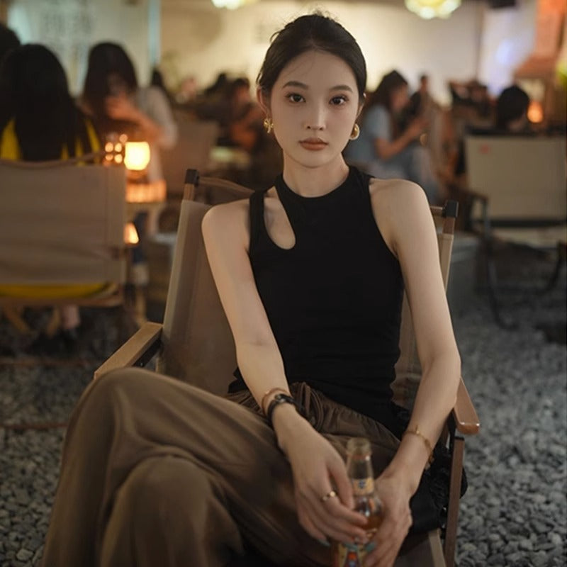 Woman wearing Wine Red Slim Fit Vest in a stylish urban setting