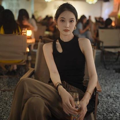 Woman wearing Wine Red Slim Fit Vest in a stylish urban setting