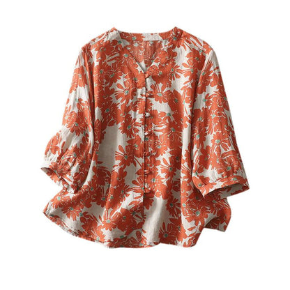 Woman wearing Floral Loose Blouse in a sunny outdoor setting