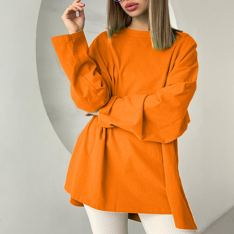 Woman wearing Loose Fit Long Sleeve Slit T-Shirt in a casual setting