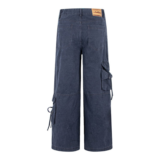 Woman wearing Spicy Girl Multi Pocket Bow Drawstring Cargo Flared Jeans in a casual setting