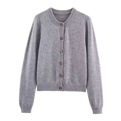 Woman wearing Round Neck Long Sleeved Knitted Cardigan Jacket in a stylish setting