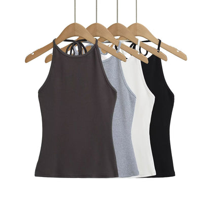 Woman wearing Backless Camisole Vest in a sunny outdoor setting