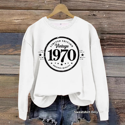 Woman wearing 1970 printed hoodie in a casual outdoor setting