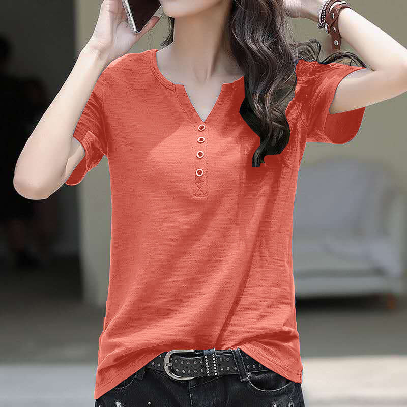 Woman wearing Loose Plus Size V-Neck Short Sleeve Casual T-Shirt in a casual setting