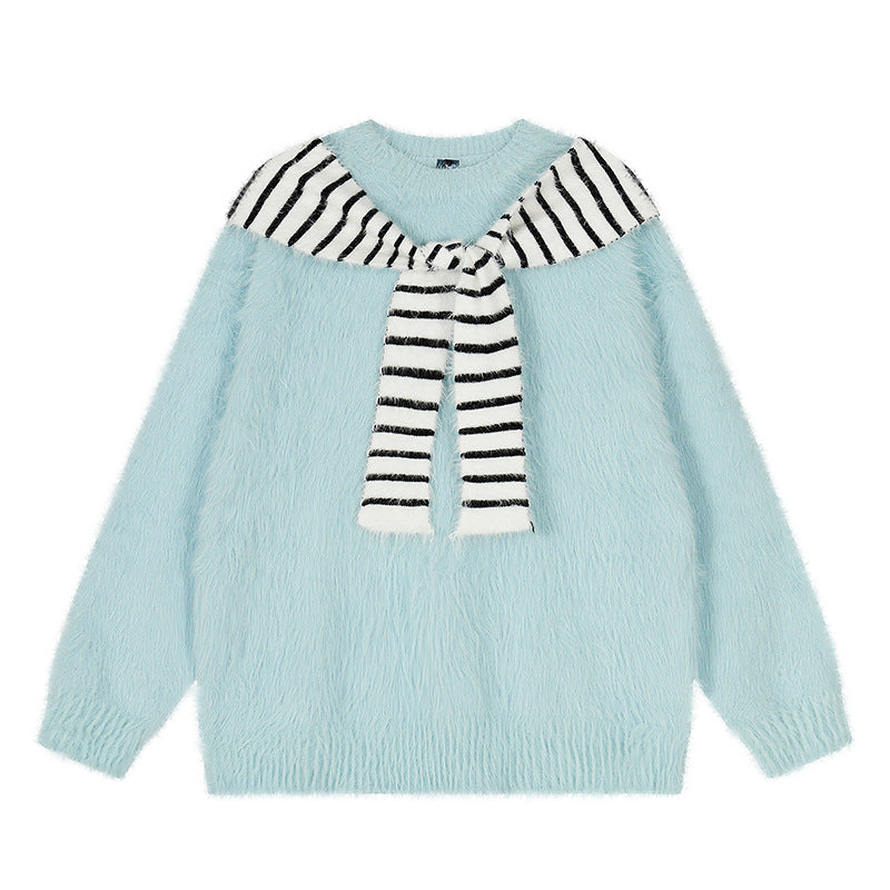 Woman wearing Oversized Loose Fit Poncho Knit Sweater in a cozy indoor setting