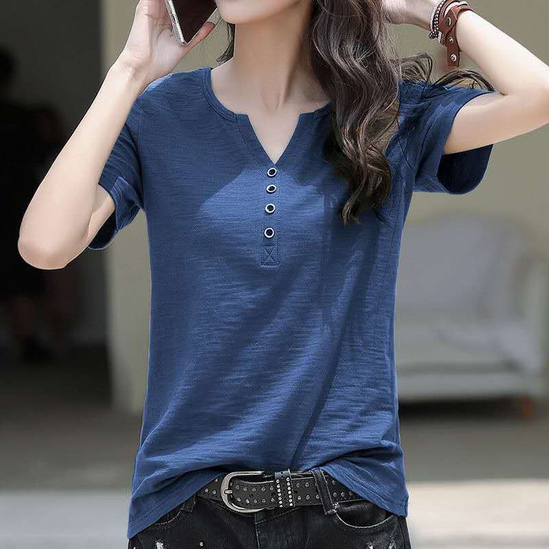 Woman wearing Loose Plus Size V-Neck Short Sleeve Casual T-Shirt in a casual setting