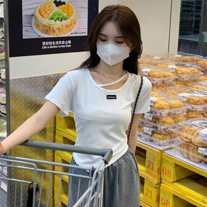 Woman wearing Irregular Design Short Sleeve Crop Top in casual setting
