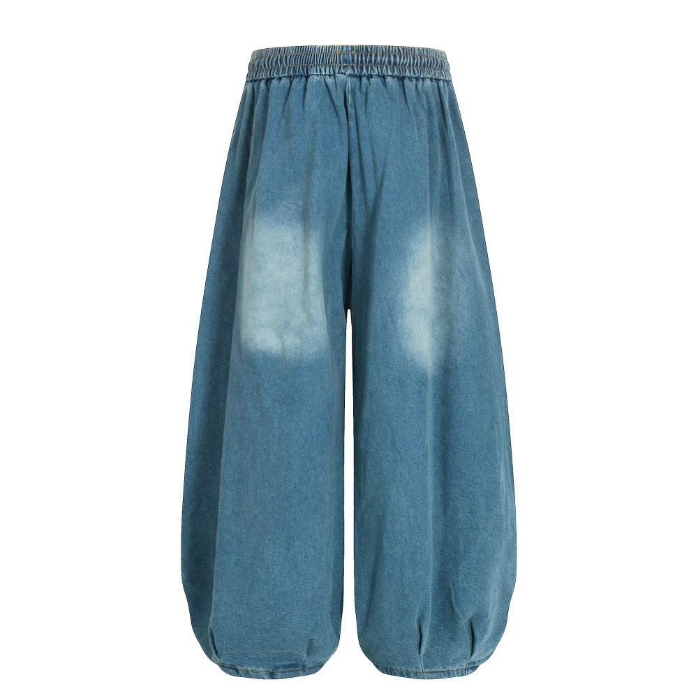 Woman wearing Color Blocked White Pleated Denim Wide Leg Pants in a casual setting